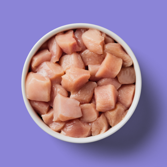 Weaning Paste Raw Chicken 500g on a light purple background.