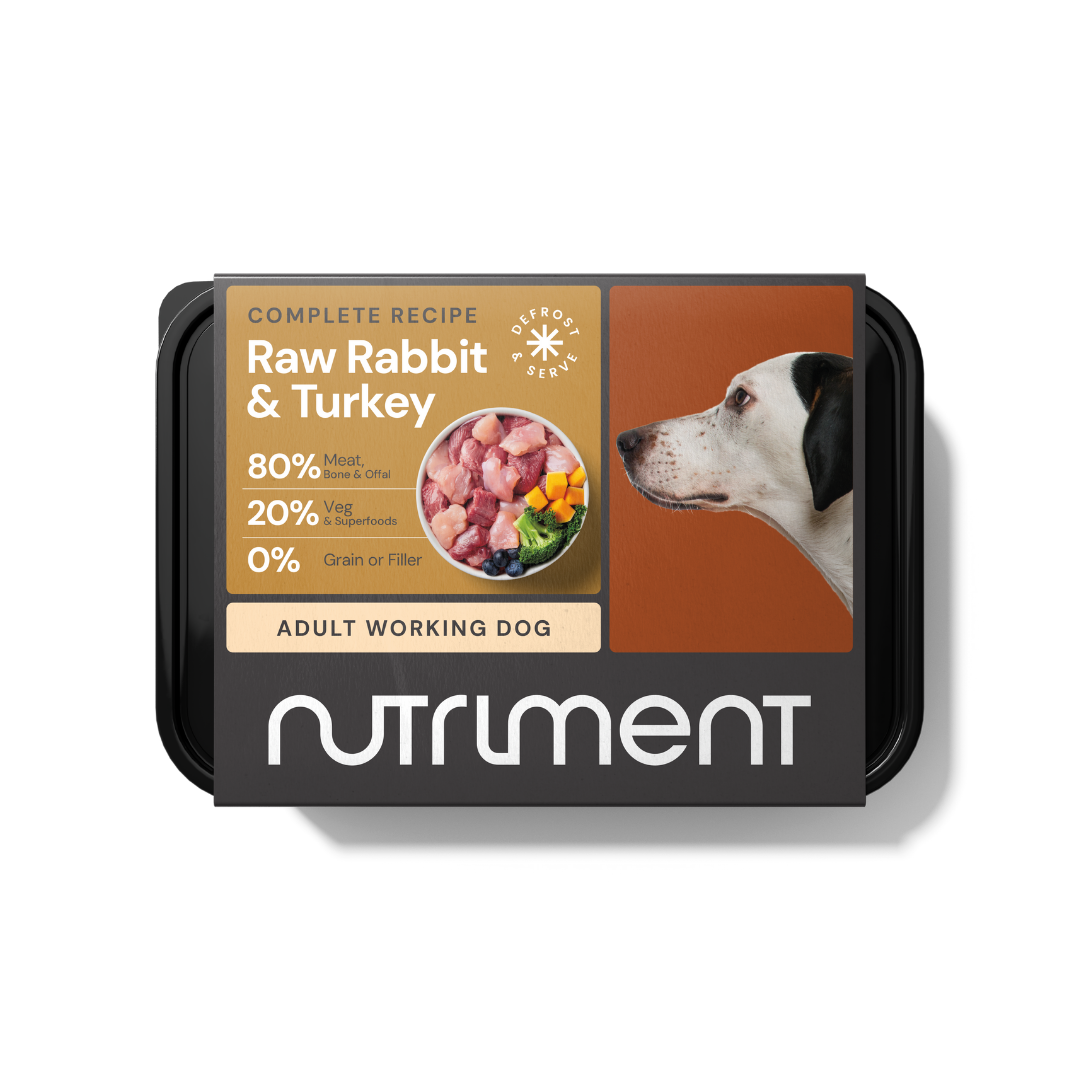 Labeled "Raw Rabbit & Turkey 500g," this premium dog food pack features a dog image and meat chunks.