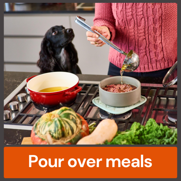 Person ladles Chicken Bone Broth 500ml into bowl on stovetop as dog watches. Text: "Pour over meals for gut health.