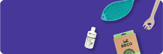 Pet products on a purple background: shampoo bottle, fish-shaped brush, and BECO-branded packaging.